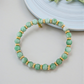 Pulseira Pedras Naturais Colors 5mm Detalhes Ouro