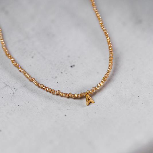 Colar Cristais e Inicial Microzircônias