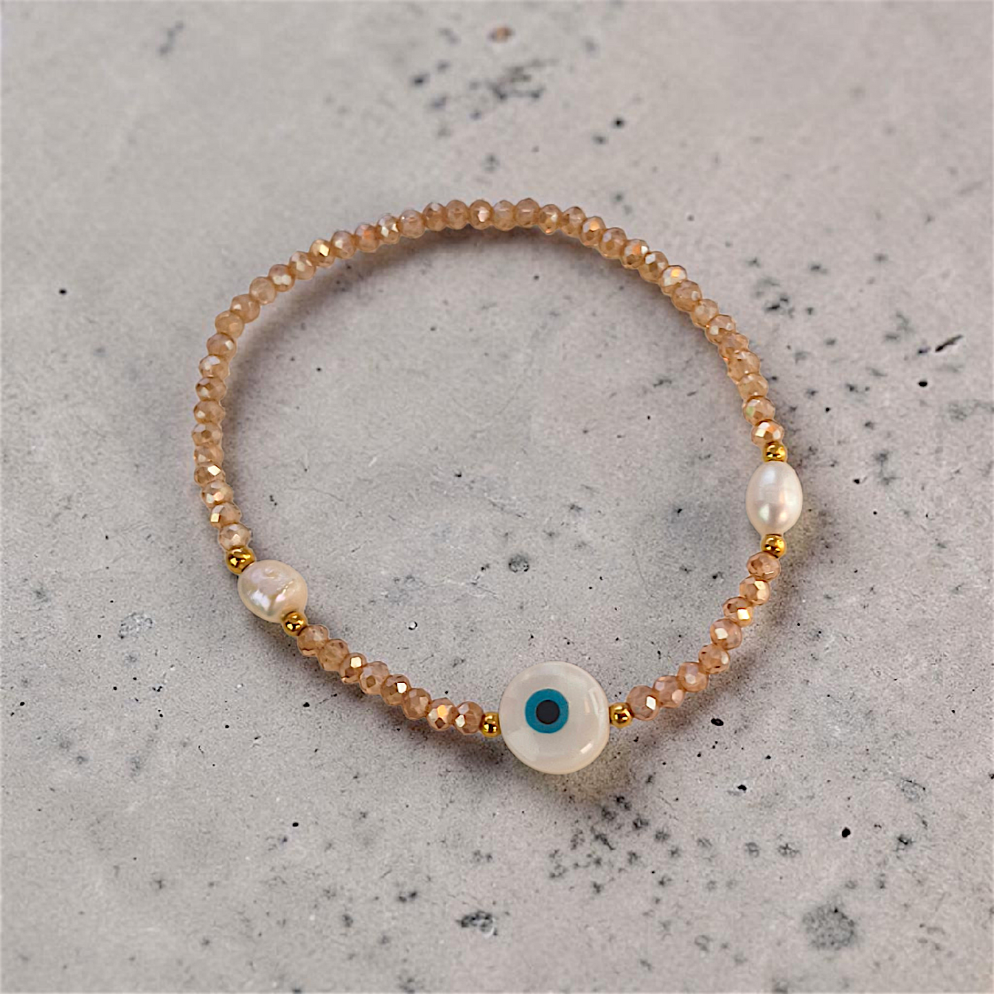 Pulseira Cristal, Pérolas e Olho Grego